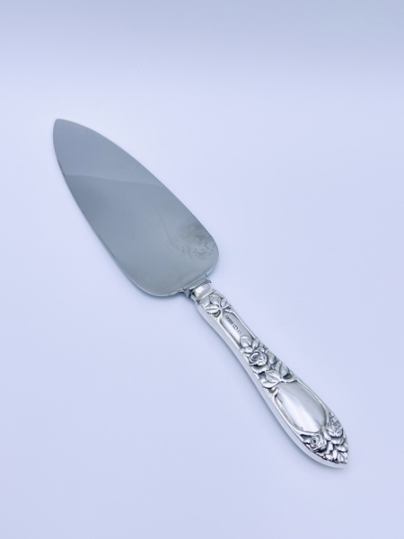  830S"Opphøyet rose" Paispade. L 26 cm. 